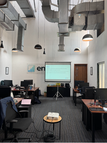 Enlyft engineers working together during the hackathon - focused on simplifying and optimizing platform features