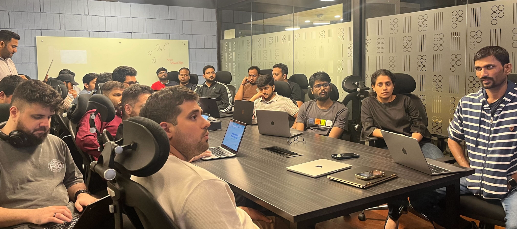 Another hackathon team showcasing their project - team members explaining technical details and business impact of their solution to the judging panel