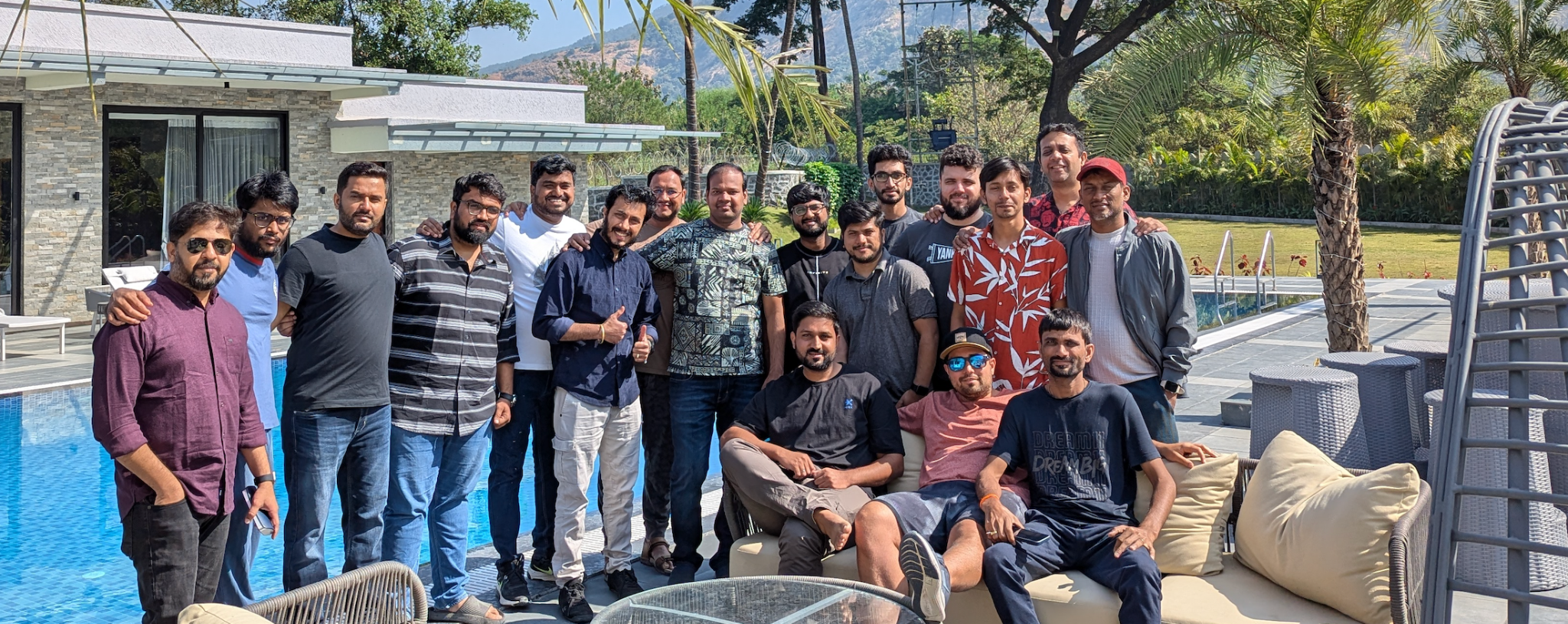Team bonding activities during the post-hackathon celebration - engineers and product managers enjoying outdoor activities and relaxing after the intense hackathon