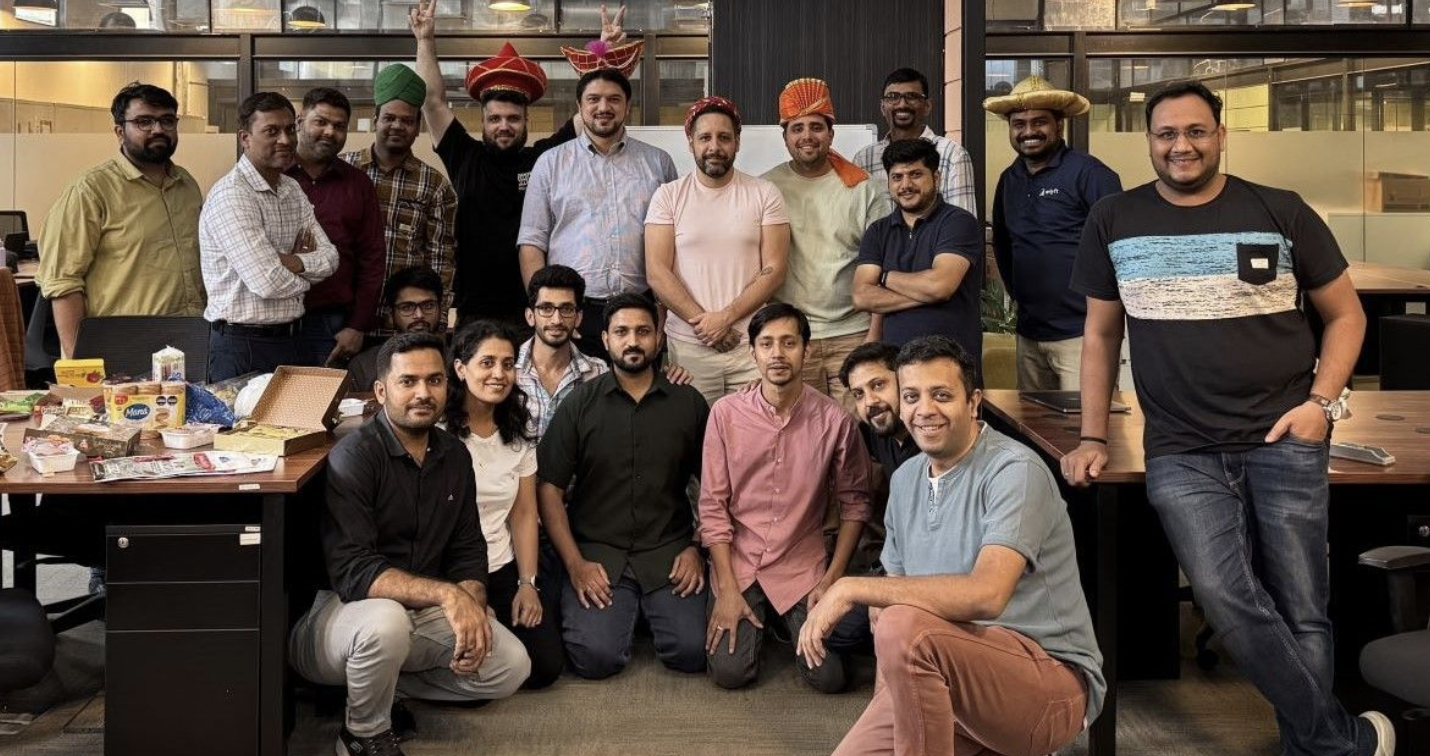 Enlyft hackathon teams collaborating together - engineers, product managers, designers, and data scientists working on innovative solutions