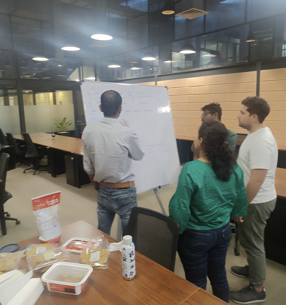 Hackathon teams in action - developers coding, brainstorming, and collaborating intensively during the 48-hour sprint
